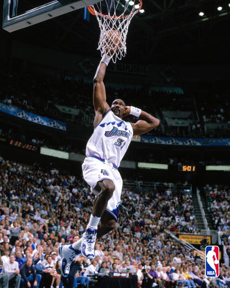 Karl Malone of the Utah Jazz goes for a dunk against the Houston